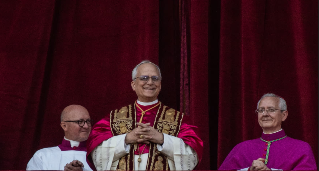 Pope Leo XIV greeting the crowd after being elected by the conclave on 8 May 2025 in the Vatican City