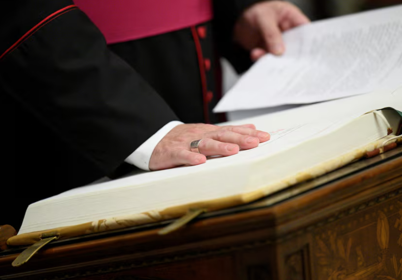 Officials, members of the clergy and Conclave staff take Oath of Secrecy in Pauline Chapel, at the Vatican, May 5, 2025. Vatican Media/Handout via REUTERS/File Photo