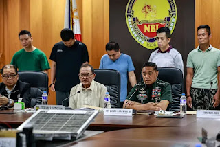 NBI Director Jaime Santiago and AFP Chief General Romeo Brawner, present five alleged Chinese spies, during a media briefing at the NBI headquarters on January 30, 2025. The suspects (L-R) Wu Chengting, Haitao Chen, Wu Jun Ren, Wang Yong Yi, and Cai Shaohuang.