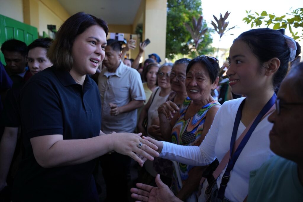 Vice President Sara Duterte interacts with supporters at the Daniel R. Aguinaldo National High School in Davao City, where she cast her vote for the midterm elections on May 12, 2025. (Courtesy: Office of the Vice President)