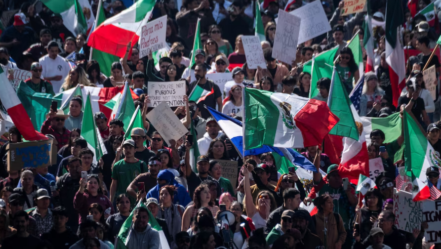 People march during a protest against the arrests and deportations of migrants by U.S. government agencies in Los Angeles, California, U.S. February 3, 2025. REUTERS/